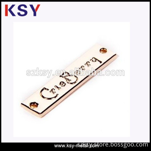 2016 new type cheap metal logo label with clothing